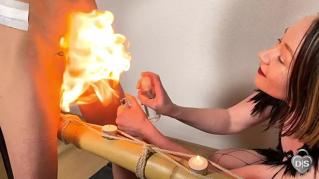 Sultry Brunette Submits to Blazing Hot Fire Play