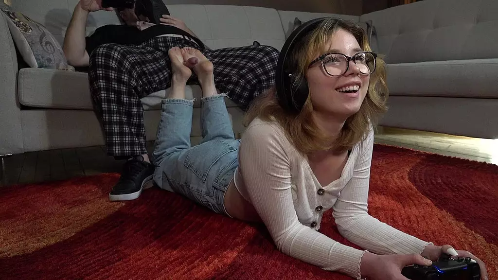 Bethany's Sneaky Footjob Gaming Session