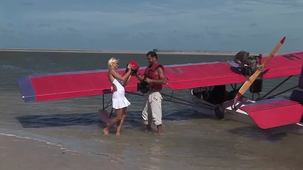 Caylian Curtis Seduces Pilot for Beach Fuck