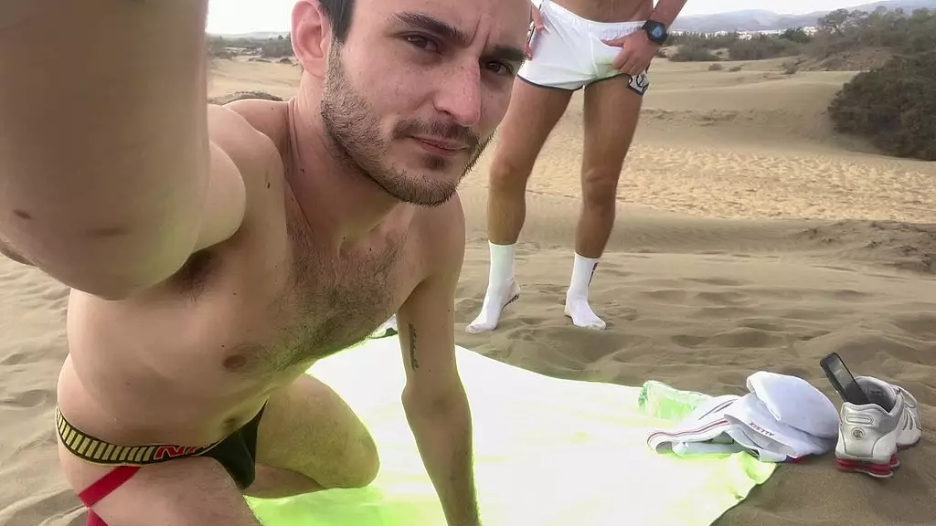 Daddy Dominates Twink on Beach with Piss Play